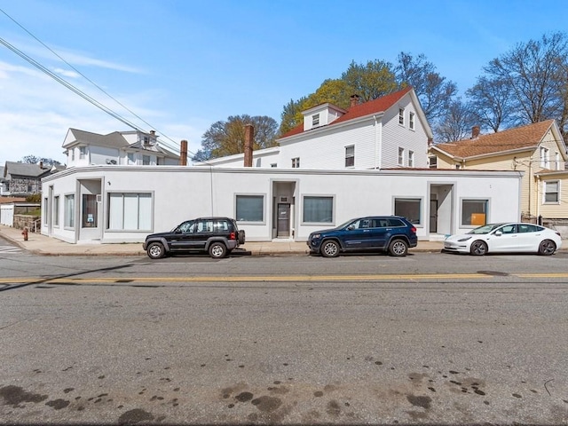view of front of home featuring stucco siding