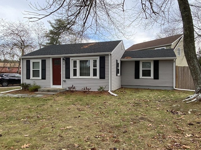 ranch-style home with a front lawn