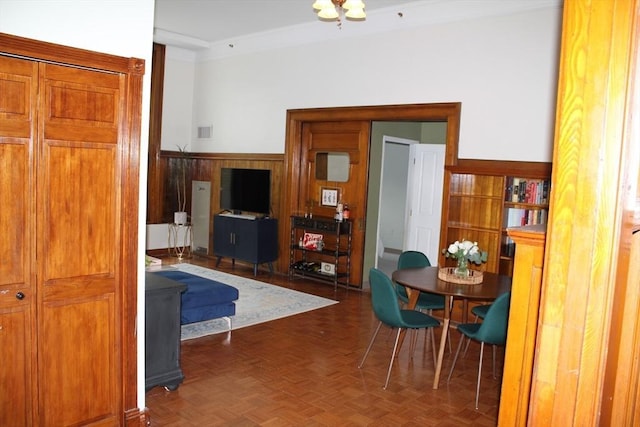 235 State St Unit 311, Springfield, MA 01103 - dining area featuring a wainscoted wall and wood walls