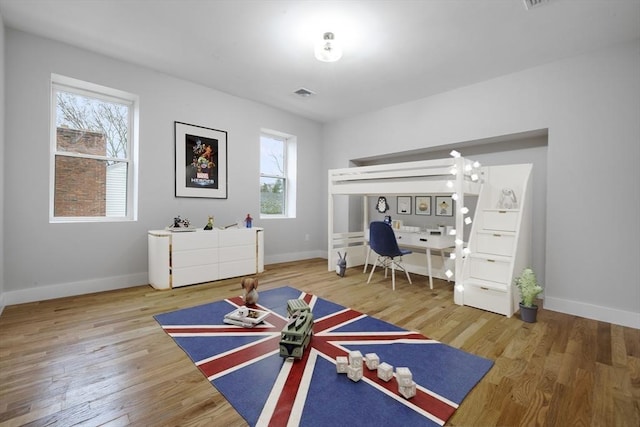 1442 Washington St, Canton, MA 02021 - bedroom with wood finished floors and baseboards