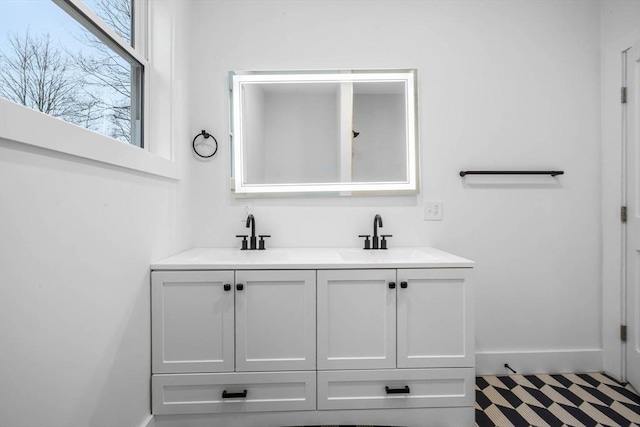 1442 Washington St, Canton, MA 02021 - full bathroom with double vanity and baseboards
