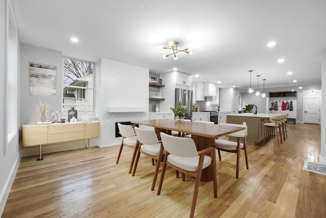 1442 Washington St, Canton, MA 02021 - dining area featuring light wood-style flooring, recessed lighting, and baseboards