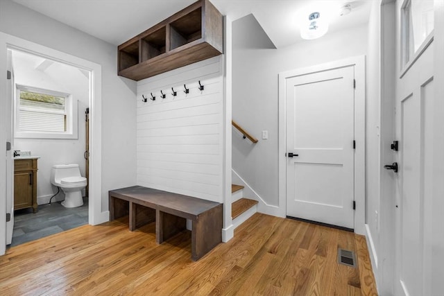 1442 Washington St, Canton, MA 02021 - mudroom featuring light wood-style floors and baseboards
