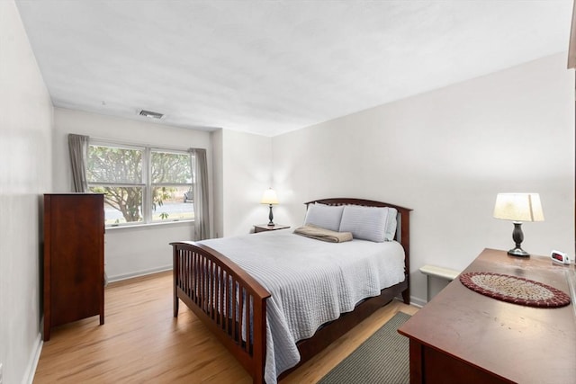 bedroom featuring light hardwood / wood-style floors