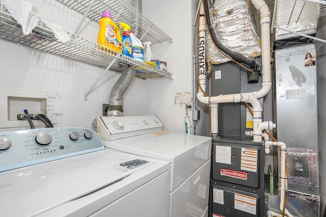 laundry area with separate washer and dryer