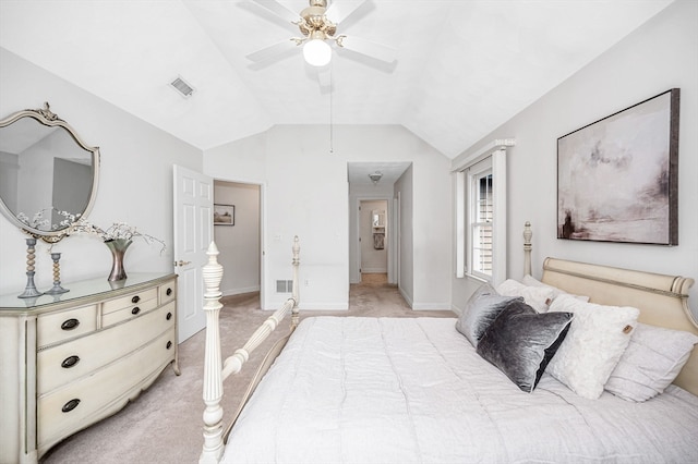 bedroom featuring light colored carpet, ceiling fan, and vaulted ceiling