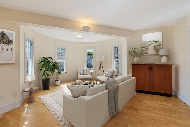 124 Boston Ave, Medford, MA 02155 - living room featuring light wood-type flooring and baseboards