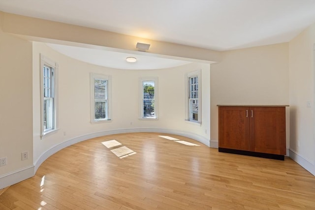 124 Boston Ave, Medford, MA 02155 - spare room with light wood-type flooring and baseboards