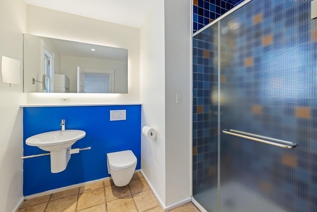 124 Boston Ave, Medford, MA 02155 - bathroom with a shower stall, toilet, baseboards, and a sink