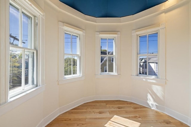 124 Boston Ave, Medford, MA 02155 - spare room with light wood-style flooring and baseboards