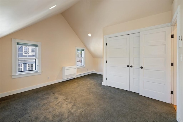 124 Boston Ave, Medford, MA 02155 - bonus room with lofted ceiling, dark carpet, recessed lighting, and baseboards