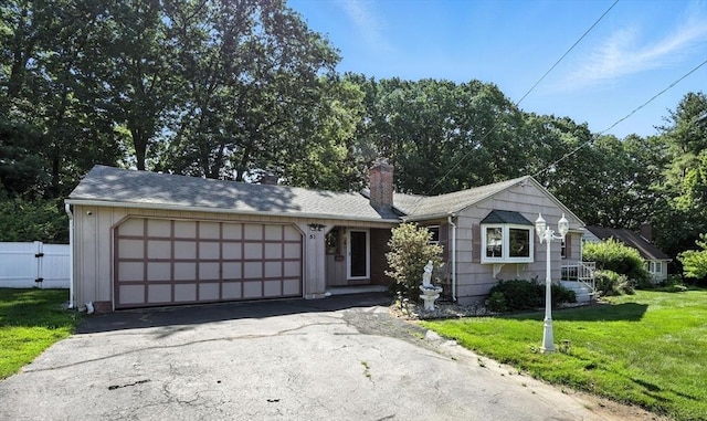 51 Glenview Dr, West Springfield, MA 01089 - ranch-style home with an attached garage, asphalt driveway, and a chimney