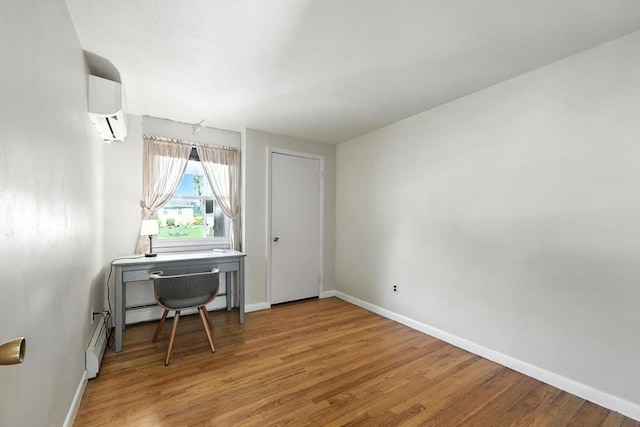 51 Glenview Dr, West Springfield, MA 01089 - office space featuring a wall mounted air conditioner, wood finished floors, and a baseboard radiator