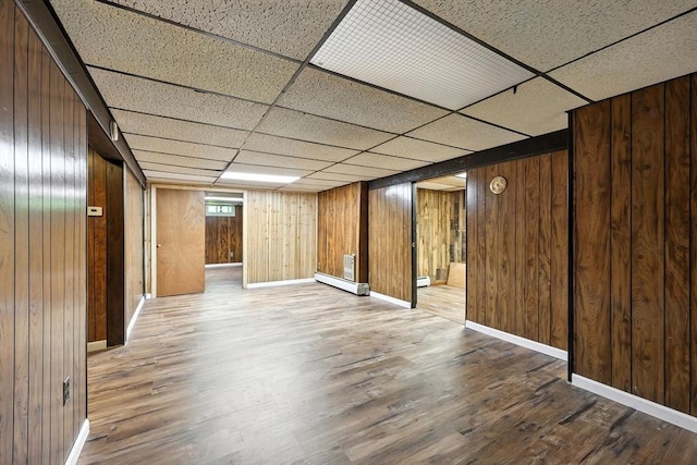51 Glenview Dr, West Springfield, MA 01089 - finished basement featuring wood finished floors, baseboard heating, wood walls, and a paneled ceiling