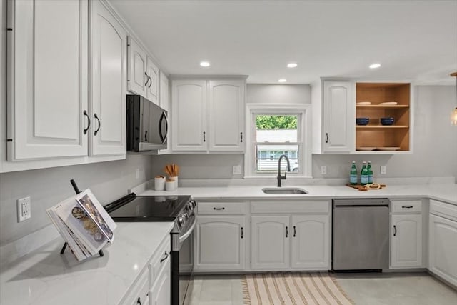 42 Stevens Ave, Braintree, MA 02184 - kitchen featuring appliances with stainless steel finishes, white cabinets, recessed lighting, and open shelves