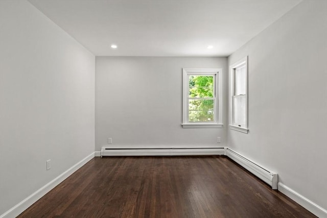42 Stevens Ave, Braintree, MA 02184 - spare room featuring wood finished floors, a baseboard heating unit, and recessed lighting