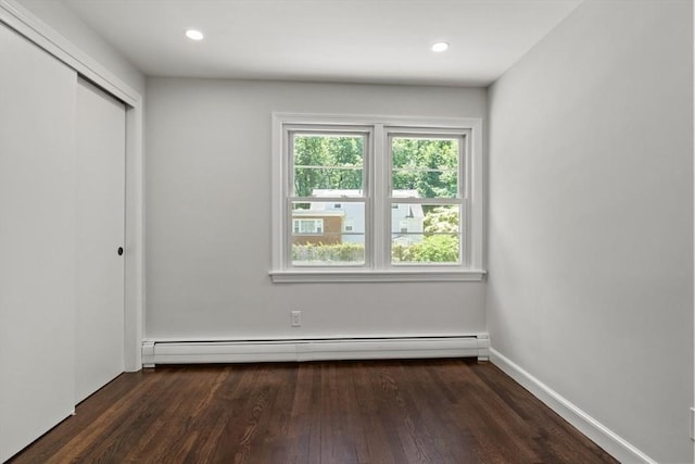 42 Stevens Ave, Braintree, MA 02184 - unfurnished bedroom with a baseboard heating unit, wood finished floors, a closet, and recessed lighting