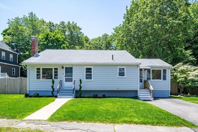 42 Stevens Ave, Braintree, MA 02184 - view of front facade featuring a chimney and entry steps