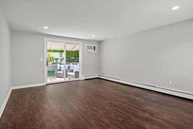 42 Stevens Ave, Braintree, MA 02184 - empty room with dark wood-style floors, a wall mounted air conditioner, a baseboard radiator, and recessed lighting