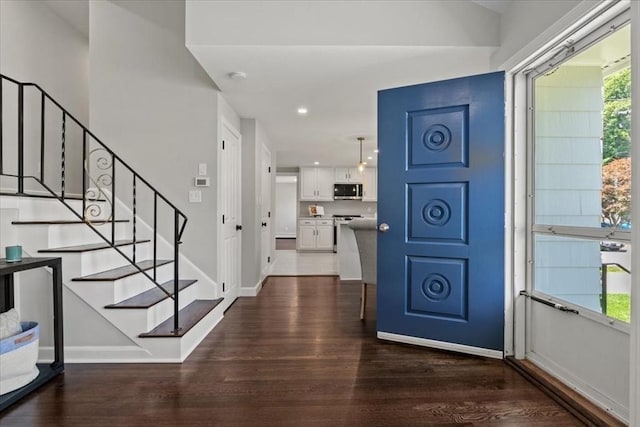 42 Stevens Ave, Braintree, MA 02184 - entrance foyer with dark wood-type flooring, stairs, and recessed lighting