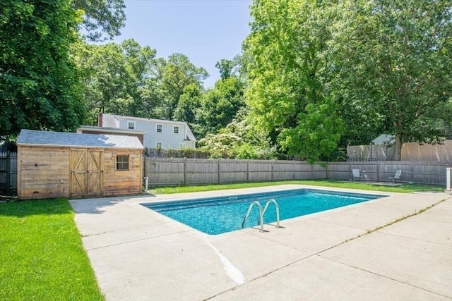 42 Stevens Ave, Braintree, MA 02184 - view of swimming pool with a fenced backyard, a patio, and a storage shed