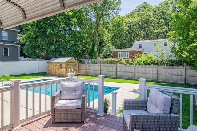 42 Stevens Ave, Braintree, MA 02184 - view of pool featuring a deck, a fenced backyard, and a storage unit