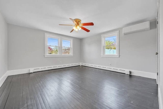 31 Darling St, Acushnet, MA 02743 - spare room with a wall unit AC, a ceiling fan, baseboards, a baseboard heating unit, and hardwood / wood-style floors