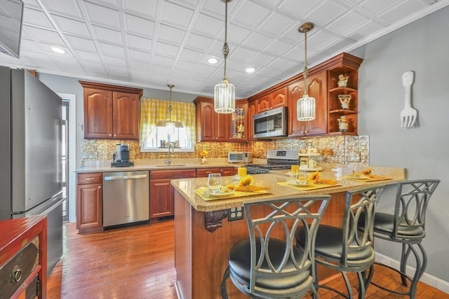 31 Darling St, Acushnet, MA 02743 - kitchen featuring a sink, appliances with stainless steel finishes, pendant lighting, and dark wood-style floors