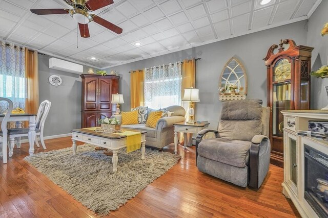 31 Darling St, Acushnet, MA 02743 - living area featuring recessed lighting, a ceiling fan, an AC wall unit, and light wood-type flooring