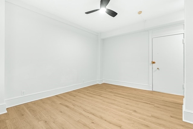 unfurnished room with ceiling fan and light wood-type flooring