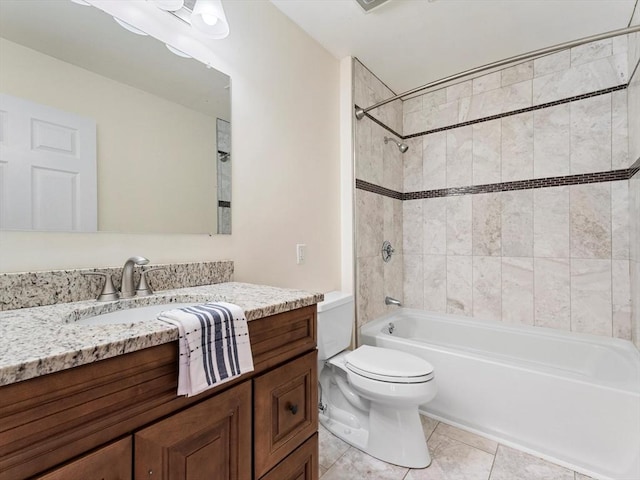 full bath with shower / bathtub combination, tile patterned flooring, vanity, and toilet