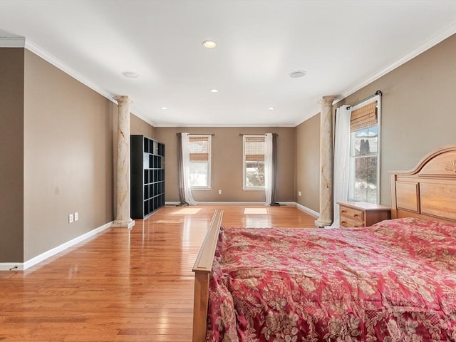 bedroom featuring light wood-style flooring, recessed lighting, baseboards, decorative columns, and crown molding