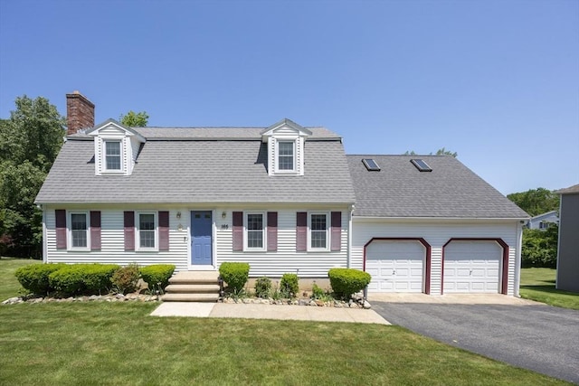 165 Roundtop Rd, Marlborough, MA 01752 - view of front of home with a garage, asphalt driveway, a front yard, and a chimney