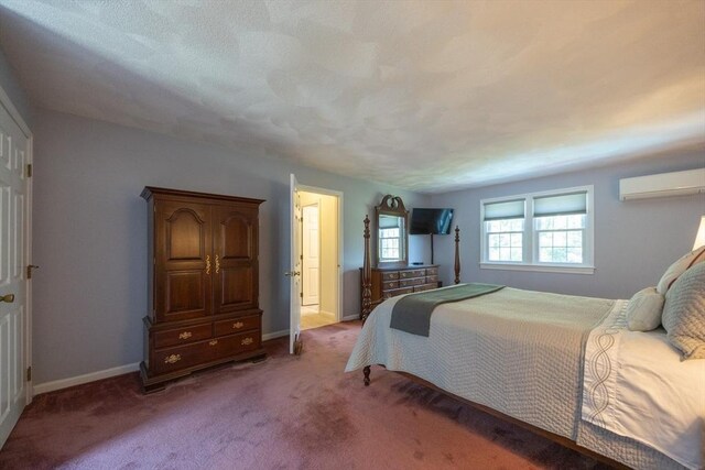 165 Roundtop Rd, Marlborough, MA 01752 - carpeted bedroom featuring a wall mounted air conditioner and baseboards