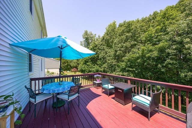 165 Roundtop Rd, Marlborough, MA 01752 - wooden terrace with outdoor dining area