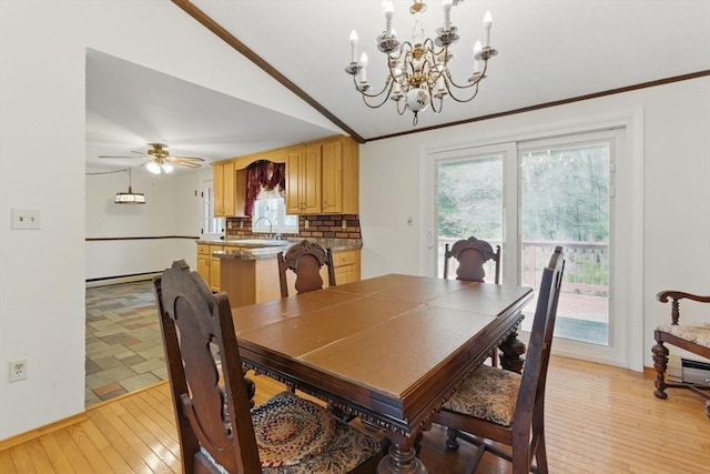 58 Daniel Shays Hwy, Pelham, MA 01007 - dining space featuring crown molding, light wood finished floors, lofted ceiling, and ceiling fan with notable chandelier