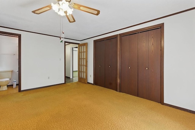 58 Daniel Shays Hwy, Pelham, MA 01007 - unfurnished bedroom with crown molding, baseboards, and carpet
