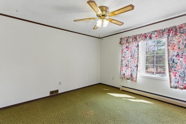 58 Daniel Shays Hwy, Pelham, MA 01007 - carpeted empty room with visible vents, a ceiling fan, crown molding, and a baseboard heating unit