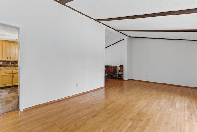58 Daniel Shays Hwy, Pelham, MA 01007 - bonus room featuring baseboards, beam ceiling, and light wood-type flooring