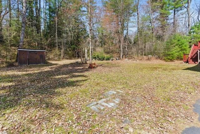 58 Daniel Shays Hwy, Pelham, MA 01007 - view of yard with a storage shed, an outbuilding, and stairs