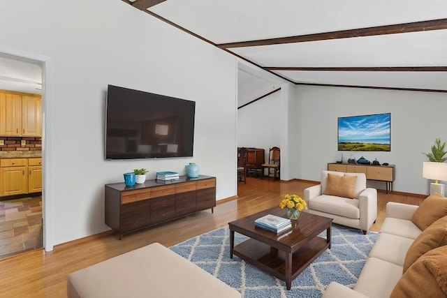 58 Daniel Shays Hwy, Pelham, MA 01007 - living room with light wood-style floors, baseboards, and vaulted ceiling