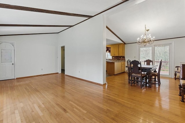 58 Daniel Shays Hwy, Pelham, MA 01007 - dining room featuring lofted ceiling with beams, light wood-type flooring, and a notable chandelier