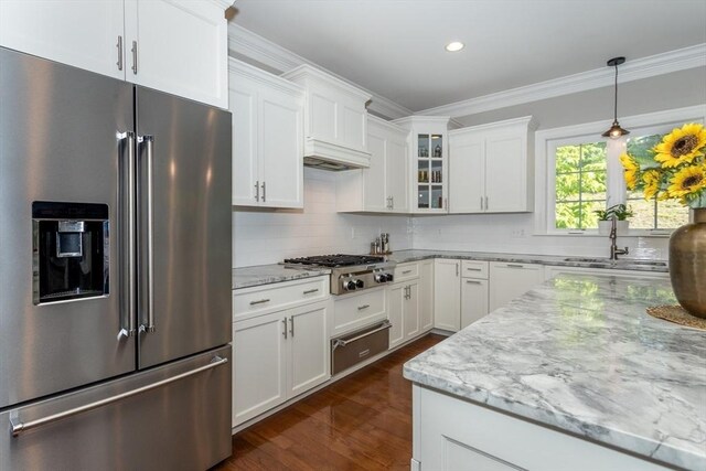 1 Clearview Dr, Franklin, MA 02038 - kitchen with appliances with stainless steel finishes, a warming drawer, a sink, glass insert cabinets, and white cabinets