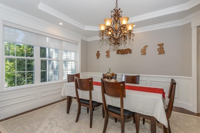 1 Clearview Dr, Franklin, MA 02038 - dining area with a chandelier, plenty of natural light, crown molding, a decorative wall, and wainscoting