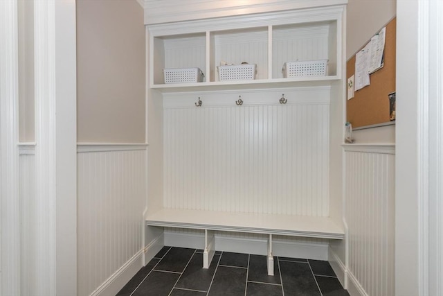 1 Clearview Dr, Franklin, MA 02038 - mudroom featuring wainscoting, dark tile patterned flooring, and baseboards