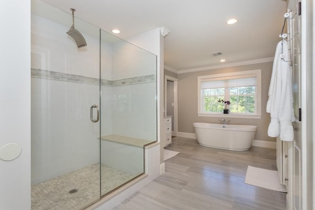 1 Clearview Dr, Franklin, MA 02038 - bathroom featuring ornamental molding, a stall shower, a soaking tub, baseboards, and recessed lighting
