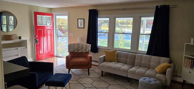 living room with a baseboard radiator and built in features