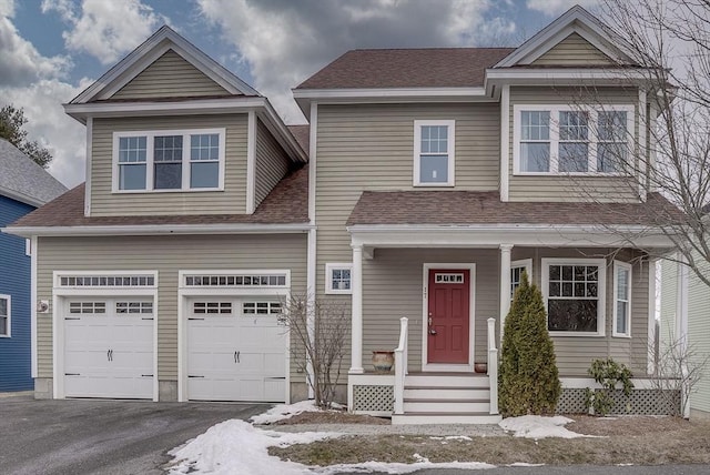 view of front of property with a garage