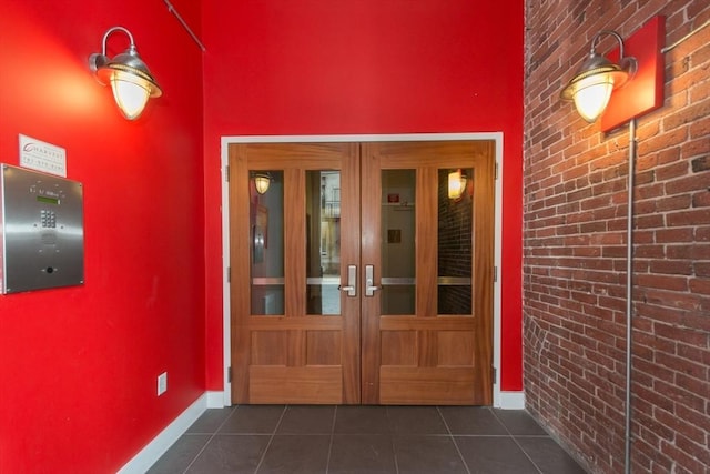 property entrance featuring french doors