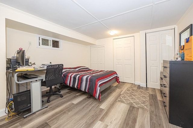 bedroom featuring wood finished floors